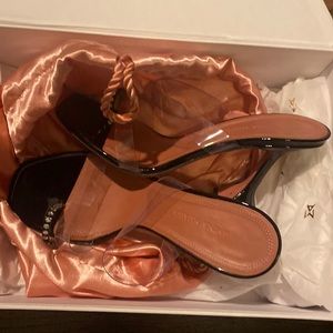 Amina muaddi sandals with clear strap and black patent heel